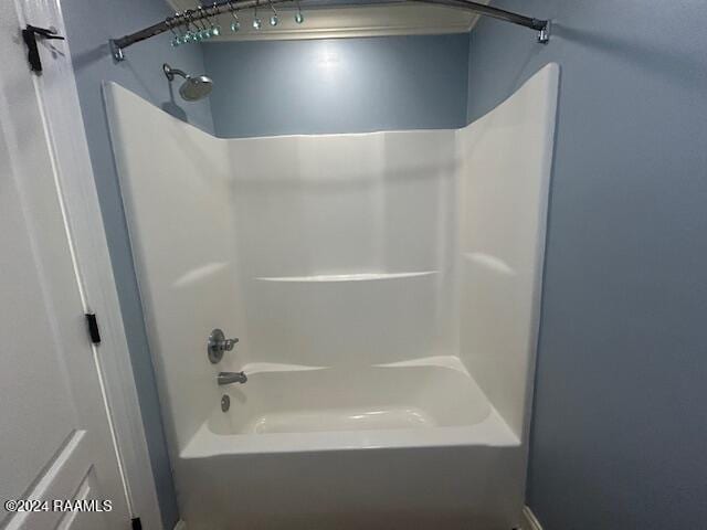 bathroom featuring washtub / shower combination