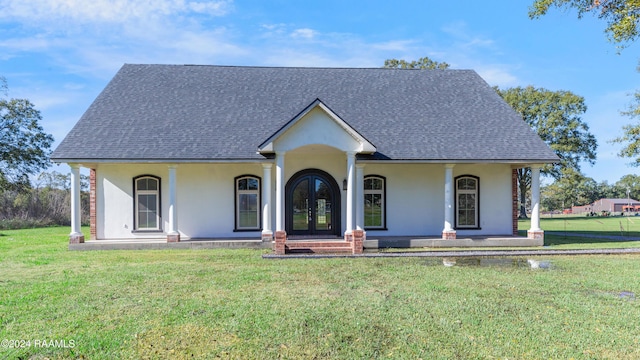 view of front of home featuring french doors and a front lawn