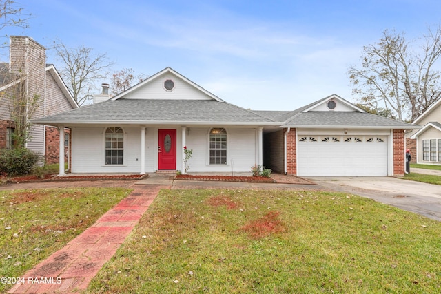 view of front facade with a porch, a garage, and a front lawn