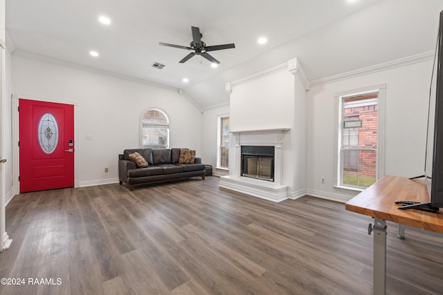 905 Rosedown Ln, Lafayette, LA 70503 - living room featuring ornamental molding, ceiling fan, wood finished floors, a fireplace with raised hearth, and vaulted ceiling