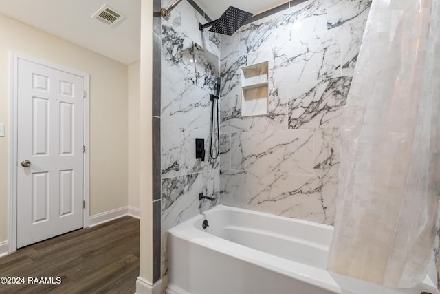 bathroom featuring shower / bath combination with curtain and wood-type flooring