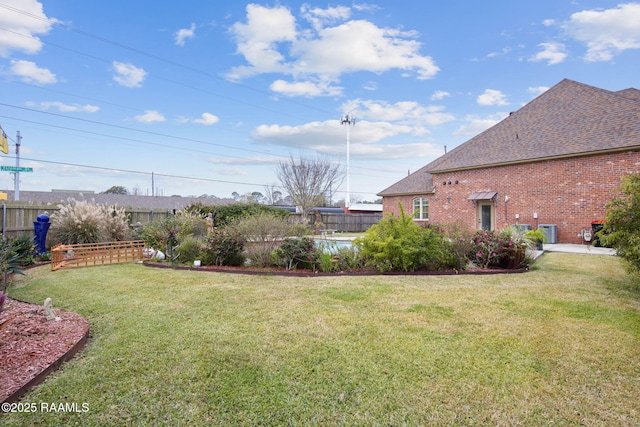 view of yard featuring fence