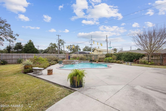 view of pool with a lawn, an in ground hot tub, and a patio