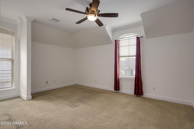 additional living space featuring light colored carpet and ceiling fan