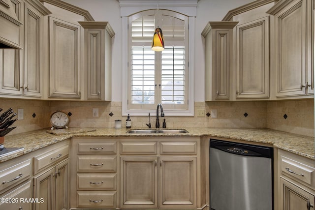 kitchen with light stone counters, a sink, decorative backsplash, and stainless steel dishwasher