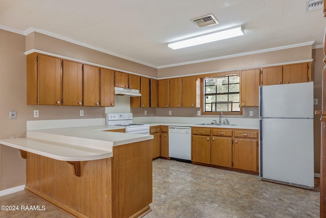 kitchen with sink, kitchen peninsula, white appliances, a kitchen bar, and ornamental molding