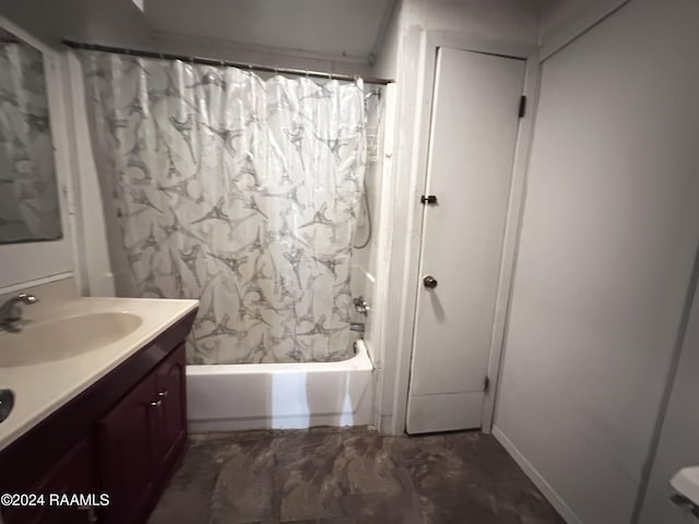 bathroom with vanity and shower / tub combo with curtain