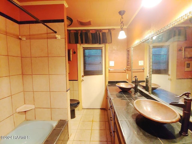 full bathroom featuring tile patterned floors, toilet, shower / tub combination, vanity, and tile walls