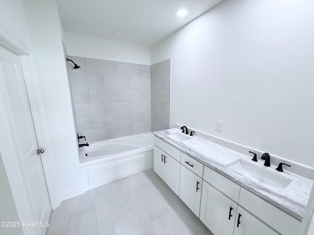 213 Berchman Oaks Dr, Lafayette, LA 70506 - bathroom featuring tile patterned floors, washtub / shower combination, a sink, and recessed lighting