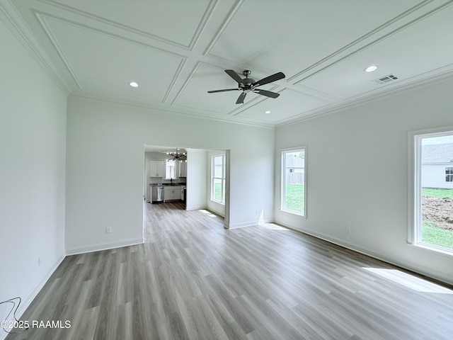 213 Berchman Oaks Dr, Lafayette, LA 70506 - unfurnished living room featuring plenty of natural light, visible vents, coffered ceiling, and crown molding