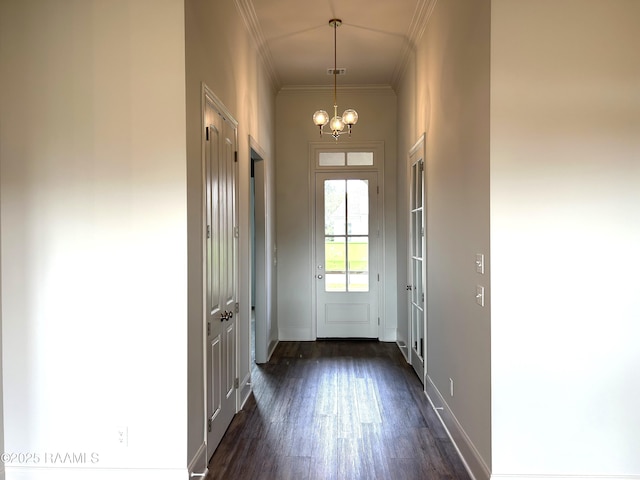 108 Fillmore Way, Lafayette, LA 70506 - entryway featuring dark wood finished floors, ornamental molding, and a chandelier