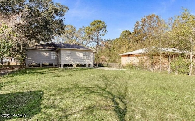 view of yard featuring fence