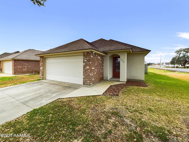 view of front of property with a garage and a front yard