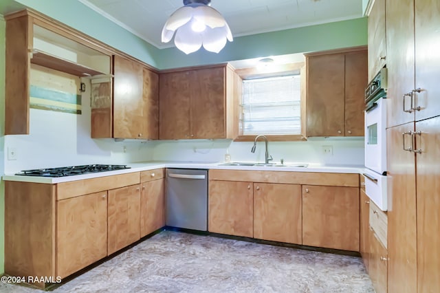 kitchen with sink, white appliances, and ornamental molding