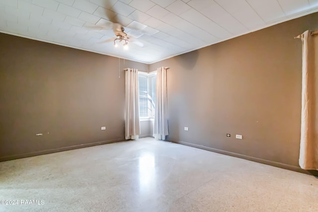 spare room with ceiling fan