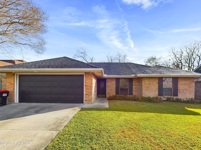 ranch-style house with a front yard and a garage