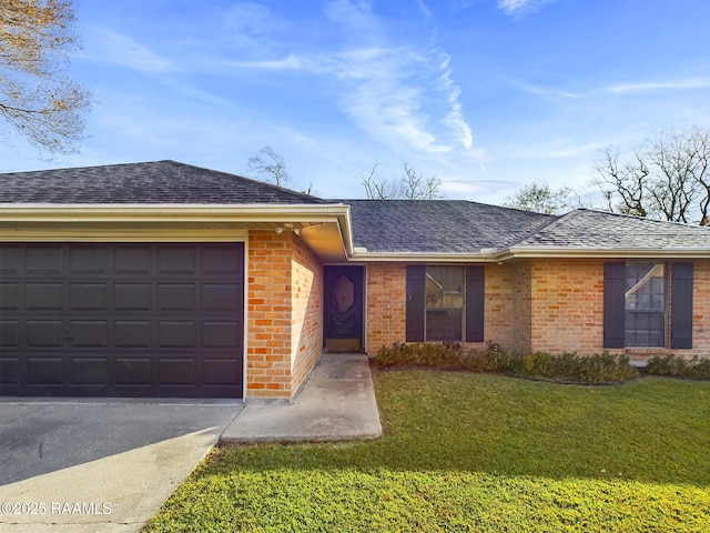 single story home with a garage and a front yard