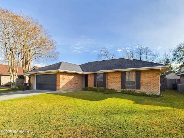 ranch-style home with central AC unit, a front lawn, and a garage