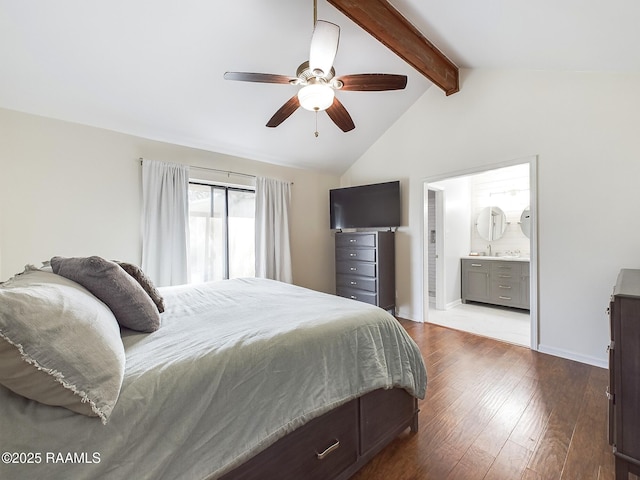 bedroom featuring ceiling fan, vaulted ceiling with beams, connected bathroom, and hardwood / wood-style flooring