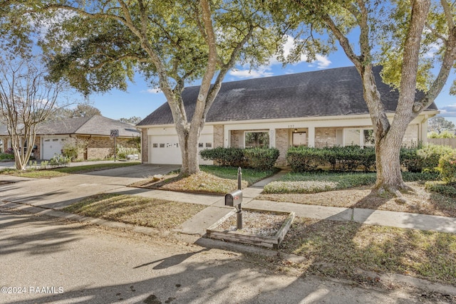 view of front of property featuring a garage