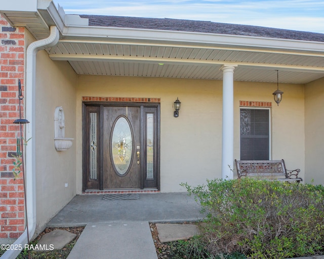 entrance to property with covered porch