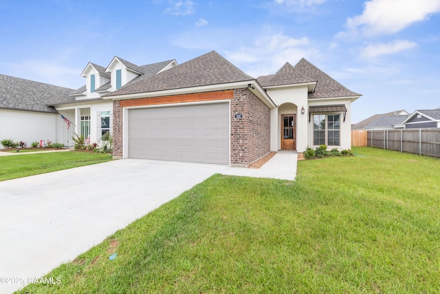 102 Fillmore Way, Lafayette, LA 70506 - view of front of property with an attached garage, concrete driveway, brick siding, and roof with shingles