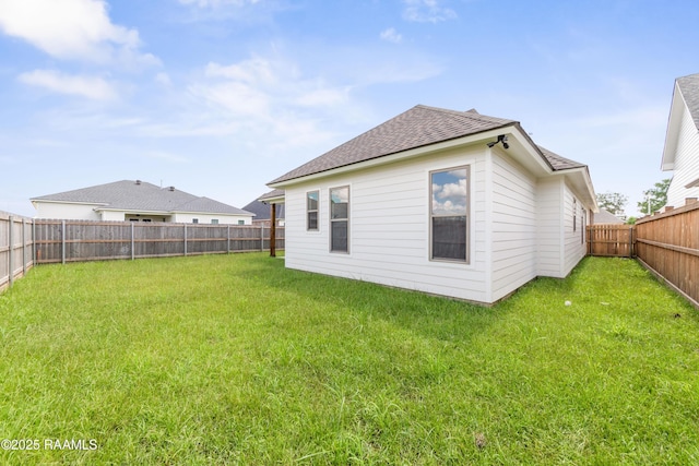 102 Fillmore Way, Lafayette, LA 70506 - back of house with a fenced backyard and a shingled roof