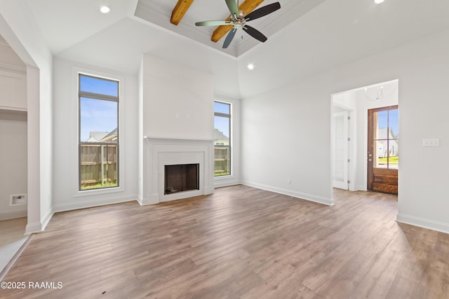 102 Fillmore Way, Lafayette, LA 70506 - unfurnished living room with recessed lighting, light wood-type flooring, a fireplace, and a ceiling fan