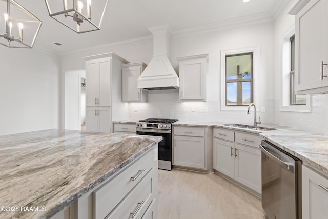 102 Fillmore Way, Lafayette, LA 70506 - kitchen featuring appliances with stainless steel finishes, custom range hood, tasteful backsplash, light stone counters, and ornamental molding
