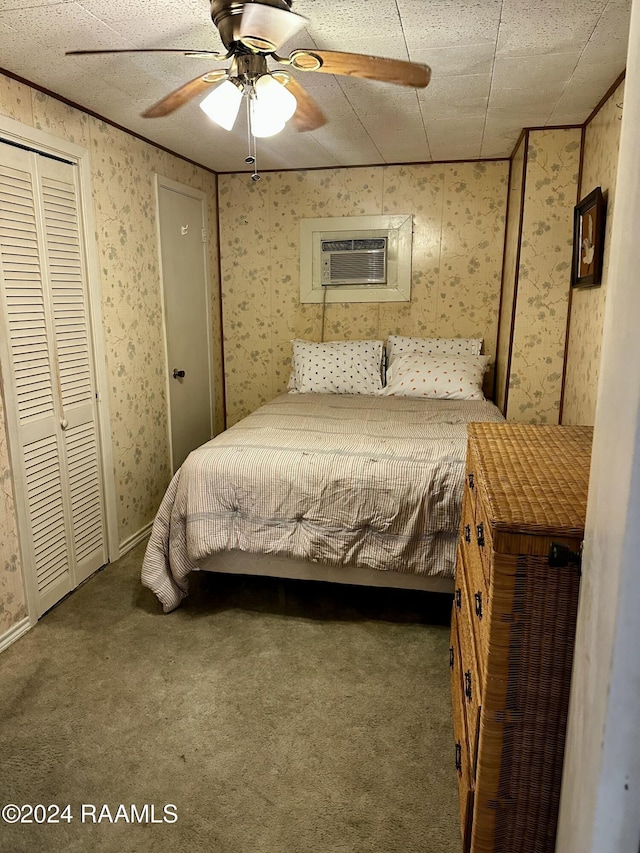 145 Pier 1 Ct, Chauvin, LA 70344 - carpeted bedroom with a wall mounted AC and ceiling fan