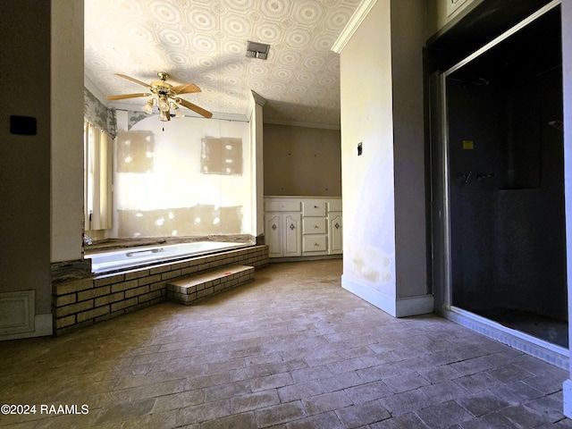 interior space with ceiling fan