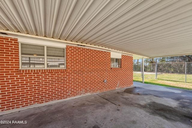 view of property exterior with a patio area