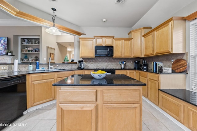 kitchen with black appliances, a kitchen island, and tasteful backsplash