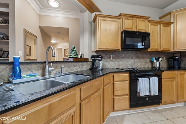 kitchen featuring sink, dark stone countertops, decorative backsplash, light tile patterned floors, and black appliances