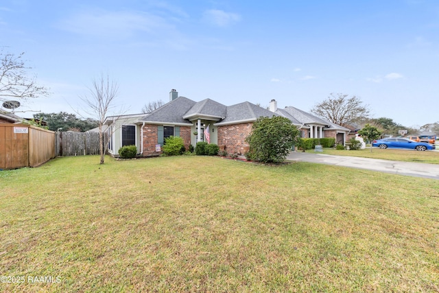 ranch-style home with a front lawn