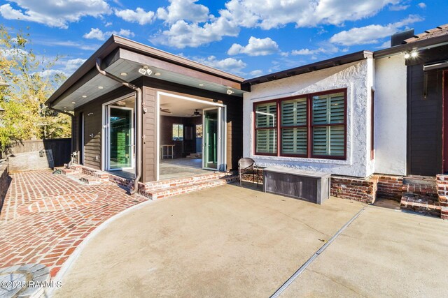 rear view of house with a patio area