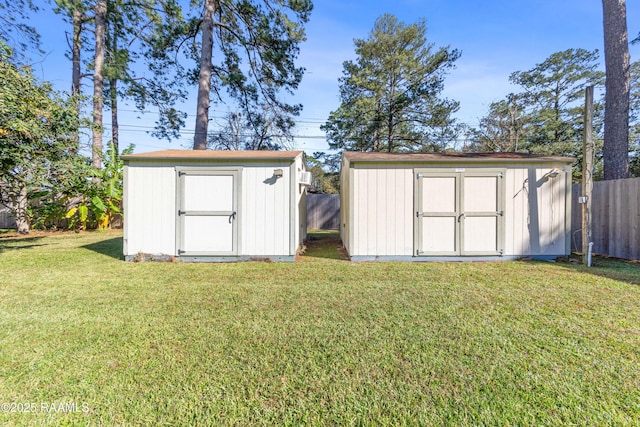 view of outdoor structure featuring a yard