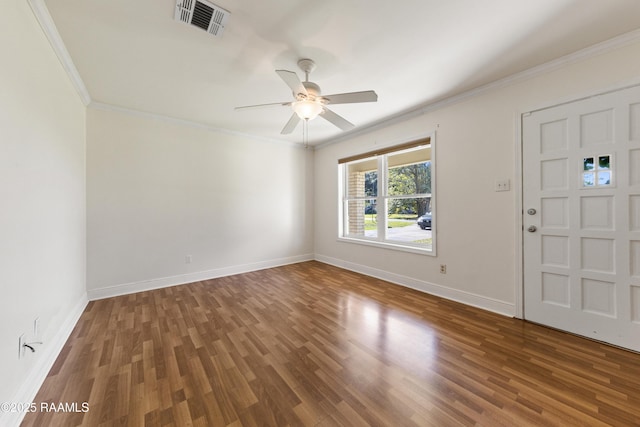 entryway featuring ceiling fan, ornamental molding, and dark wood-type flooring