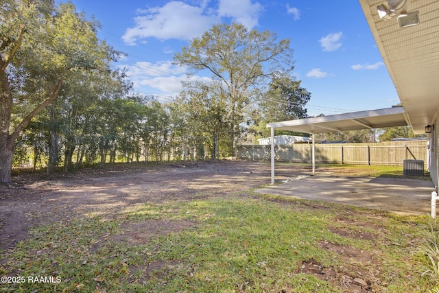 view of yard featuring a patio and cooling unit