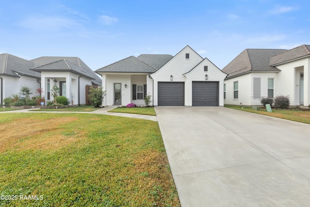 view of front of property featuring a garage and a front lawn