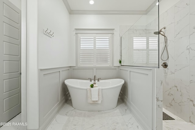 bathroom with separate shower and tub and ornamental molding