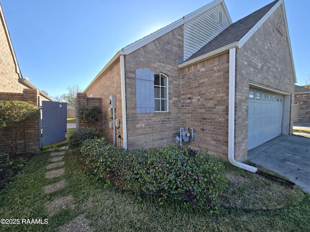 view of property exterior with a garage