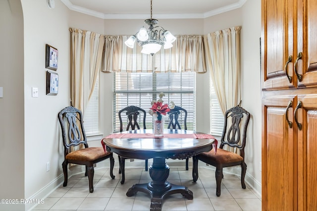 tiled dining area with a chandelier and ornamental molding