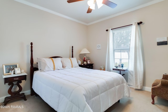 bedroom featuring ceiling fan, carpet, and ornamental molding