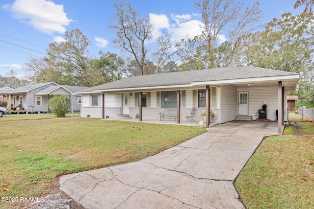 ranch-style home with a carport, covered porch, and a front lawn