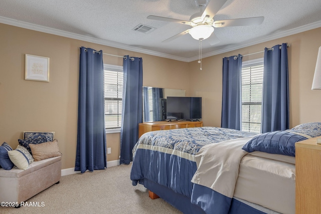 carpeted bedroom featuring a textured ceiling, ceiling fan, and crown molding