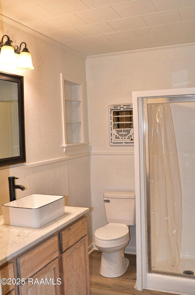 bathroom featuring vanity, curtained shower, and wood-type flooring