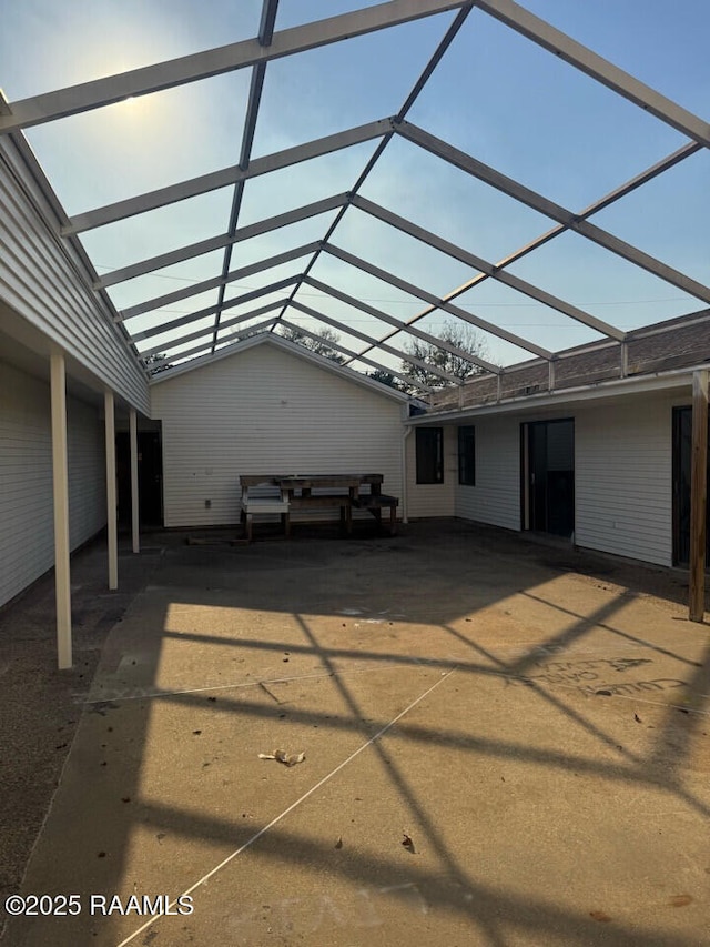 view of patio / terrace with a lanai