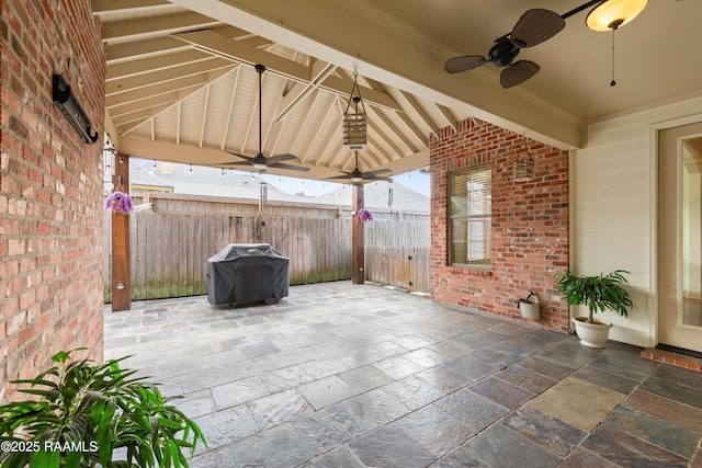 view of patio / terrace with area for grilling and ceiling fan