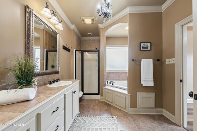 bathroom with vanity, an inviting chandelier, tile patterned floors, ornamental molding, and independent shower and bath